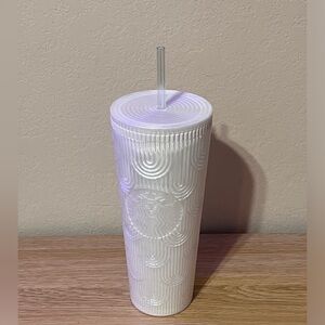 White Starbucks cup.